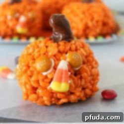 Pumpkin Krispies Treats - easy rice krispie treats that look just like pumpkins! Perfect treat for kids for halloween, thanksgiving or fall in general!