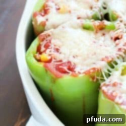 Beloved Homemade Stuffed Bell Peppers 2 A top-down view of a classic stuffed green bell pepper recipe