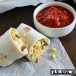Freezer Breakfast Burritos are the best breakfast for busy people! Fix up a batch (so easy!) and throw in the freezer. When you're rushed to get out the door in the morning, throw a freezer breakfast burrito in the microwave and you're out the door with a healthy breakfast in minutes!