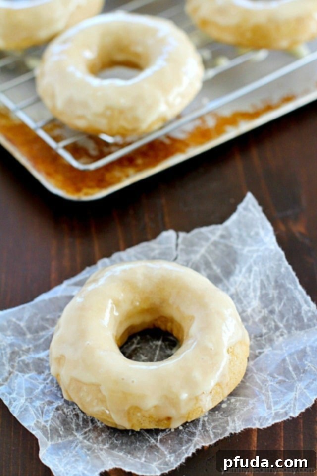 Baked Eggnog Donuts with Eggnog Glaze for the breakfast WIN! These homemade donuts are full of eggnog flavor, moist on the inside, totally easy to make and completely dairy free! If you like eggnog, these are a must-make! Perfect for Christmas breakfast!! AD