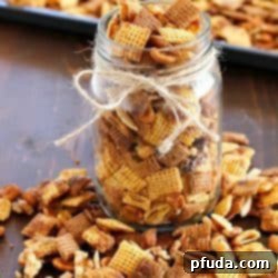 Sweet Maple Nut Crunch 2 A bowl of freshly baked Maple Nut Party Mix, ready to be served or packaged