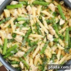 Delicious Creamy One-Pan Chicken Asparagus Pasta, a quick and easy recipe cooked from start to finish in one pan.
