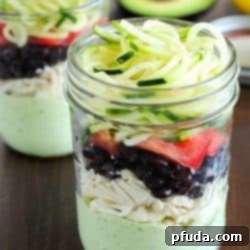 Southwest Zoodle Jar Magic: Avocado Cream Dressing & Your Chance to Win! 2 Avocado dressing (southwest style!) is nestled on the bottom of this delicious mason jar salad with zucchini noodles on the top and chicken, veggies and black beans tucked in the middle. A delicious and healthy low-carb, low-sugar lunch prepared ahead of time and eaten on-the-go! Plus a HUGE Blendtec Giveaway you won't want to miss!!