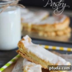 A beautifully frosted slice of homemade Swedish Pastry, ready to be enjoyed.